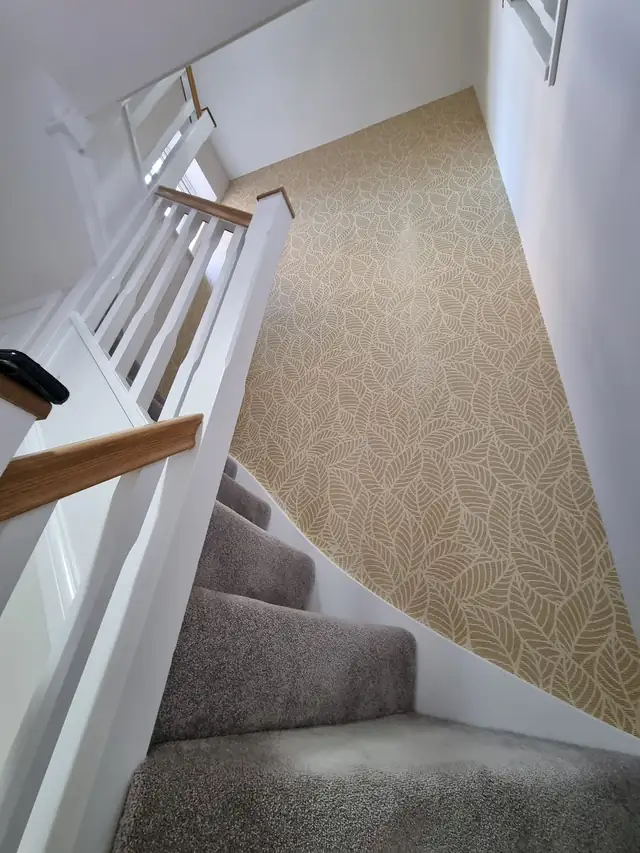 Gold leaf wallpaper on a stairwell